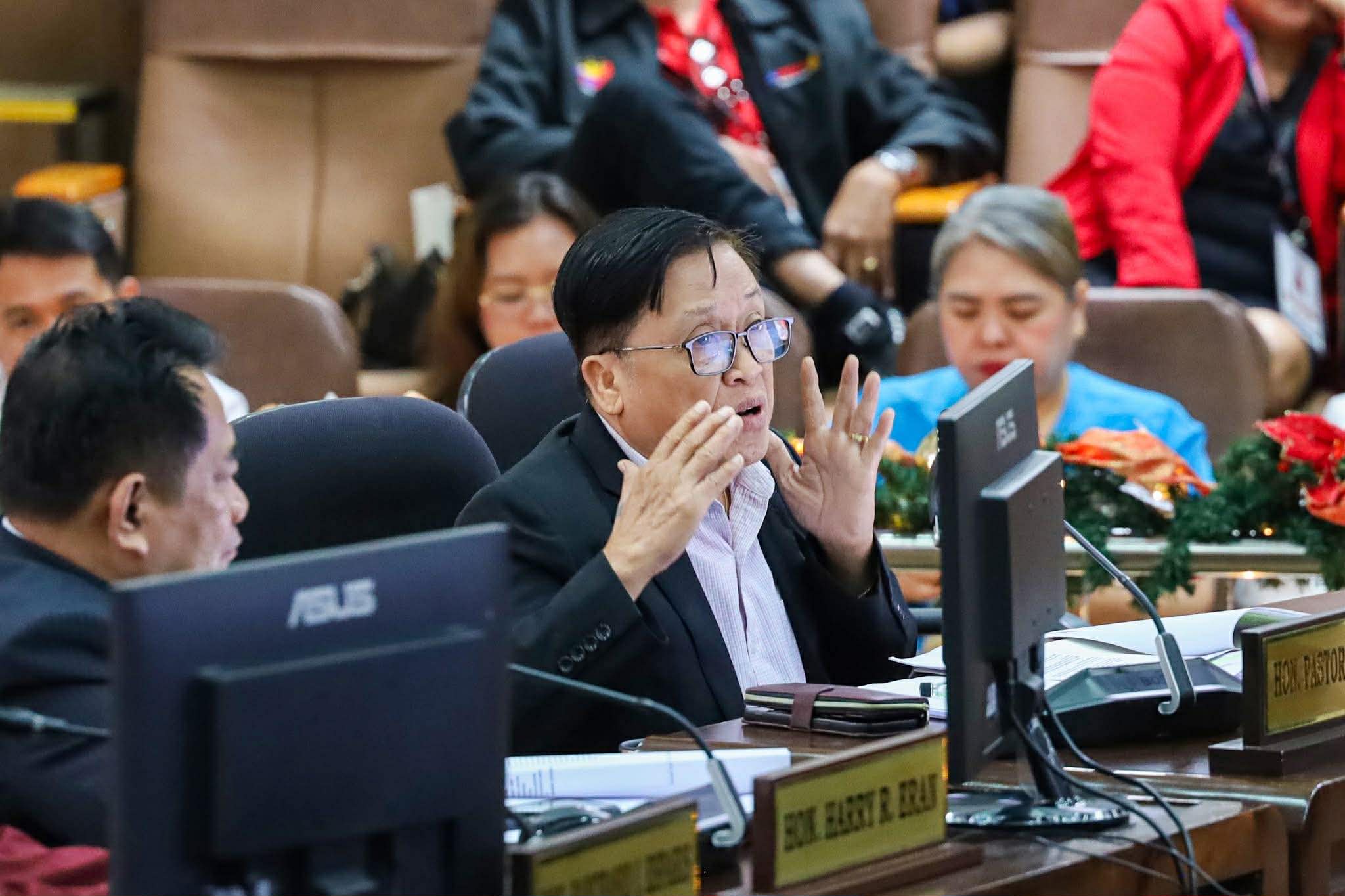 Alcover questions parking fees, urges city probe