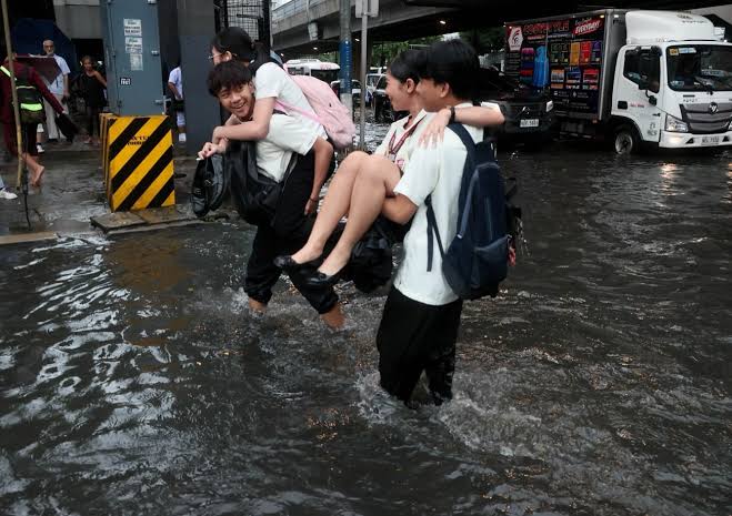 DOLE says private firms may suspend work during severe weather