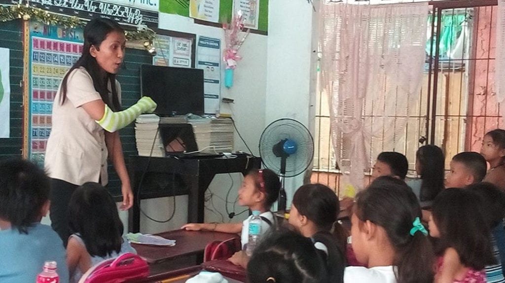 Marcos vows no public school teacher will retire as Teacher I